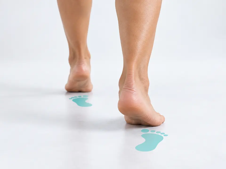 Feet moving through the walking cycle